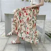 Boho kvinnor blomma midi lång pläterad kjol elastisk midja strand solig s blommig tryck fodrad sommar kläder Jupe Femme 210520