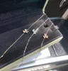 V الذهب المواد قلادة قلادة قلادة مع الماس سباركلي للنساء مجوهرات الزفاف هدية لديها ختم عشيق القرط سوار PS4872