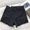 Kvinnor Summer Fashion Tassel Jean Denim Shorts tvättade nödställda jeans rippade casual Korea dragkedja flyga sexig 211129