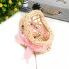 20pcs Mini Rattan Baby Cradle Candy Box Regali per gli ospiti Bomboniere Scatole per bambini Souvenir Gender Reveal Baby Shower 210724