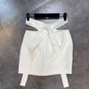 Casual solid kjol för kvinnor hög midja patchwork ihålig ut spets upp mini kjolar kvinnlig sommar mode stilig 210521