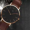 Andra klockor armbandsur designer mens titta på kvinnor modeklockor daniels svarta urtavla läderband klocka 40mm 36mm montres homme