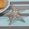 Partihandel 100st / Lot Rhinestone Starfish Servett Ring Serviette Holder Bröllopsdekoration Party Favor SN2644