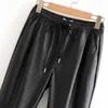 Trafik Kvinnor Faux PU Läderfickor Byxor Vintage Mode Elastisk Midja Drawstring Slips Ladies Ankelbyxor Pantaloner Mujer 210925