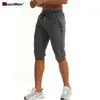 Pantaloni della tuta da uomo Magcomsen maschile 3/4 Summer Casual Gym Fitness Pockers Zip Pocket Allenamento Pantaloni Pantaloni Bottini per tracce Uomini 210810