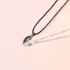 Hjärtformad magnetisk sugande halsband svart + vit stenälskare par hängsmycke med 60cm kedja