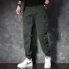 Pantaloni da uomo Cargo Spring Multi-tasche larghi Nove minuti Trendy Brand Street Casual Sports Khaki Military Green