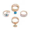 4pcs / set moda turchese diamante malvagio occhio anelli dito con pietre laterali donne ragazze anello gioielli set