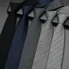 grey suit bow tie