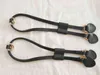 A pair of cinch drawstrings for luxury handbag ,real vachetta leather strap and slider