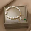 Bracelet en perles de millet d'eau douce, plaqué or 14 carats, Design de Niche, tissé à la main pour copines, Inte22