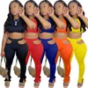 HAOYUAN Sexy Conjunto de dos piezas Trajes de verano para mujeres Crop Top y dobladillo hueco con cordones Pantalones Sweatsuit Club Cumpleaños Conjuntos a juego Y0625