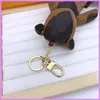Keychain Women Mens Designer Keychains Animal Key Charm Lovers Puppet Bear Luxurys Designers Car Wallet Bag Cartoon Keychainsd2180277D