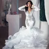2021 Afrikansk långärmad sjöjungfru bröllopsklänningar Ruffles kjolhölje Tågapplikationer Silver Lace Trumpet Brudklänningar Skräddarsydda Brudklänning