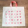 Bolsas de regalo de corazón rosa, bolsas de plástico, bolsas de embalaje de regalo de tela 25 unids/lote 210323