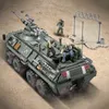 1036pcs EUA Série Militar Stryker Veículo Building Blocks City Armored Carro Army Soldados Arma Tijolas Crianças Brinquedos Crianças Presentes Y1130