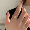 مايكرو مطعمة الزركون الفرنسية الصليب اللؤلؤ الدائري أنثى سوبر الجنية الأزياء شخصية مؤشر إصبع تصميم خاتم تصميم