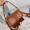 Tasarımcı Toyby School yan omuz çantaları kadınlar için lüksler siyah beyaz fasulye çanta bayanlar küçük vintage crossbody hoyger