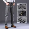 Mäns Stretch Regular Fit Jeans Business Casual Classic Style Fashion Denim Trousers Male Black Blue Grey Pants 220115