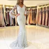 2021 Silver Lace Mermaid Prom Dresses V Neck Appliques Illusion Långärmade Sexiga Baklösa Formella Klädkvällar