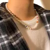 SHIXIN Boho Asymmetrie Perlenhalsband Damen/Männer Mode Sommer Bunte Perlen Halskette 2021 Schmuck für Hals Mädchen Geschenk