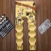 Masculino fino lótus flor pássaro impresso calça jeans moda chinês pintura amarela calças de denim amarelo