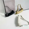 Tendance français bâton aisselle sac mode brique petit sac à bandoulière simple style étranger en cuir portable femmes