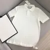 21SS Men T Shirt Designers Polo Lett G Modne koszule Kobieta Kobiety z krótkim rękawem Czarne białe lato Bests Sprzedaż męskiej Tshirt Tshirt Casual Tops Hurtowe L0VX