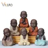 Vilead Ceramiczne posągi Buddy Nowoczesne Mini Monk Rzeźba Zestaw Herbaty Satu Miniaturowe Figurki do dekoracji Domu Akcesoria 210827