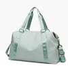 Wholesale- hand yoga bag, female, wet, waterproof, large, ggage bag, short travel bag 50*28*22 high quality with brand logo4916563