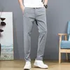 Pantalones casuales de primavera de verano Men pantalones elásticos delgadas