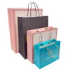 100٪ مخصص طباعة هدية التفاف التسوق الملابس أحذية اللباس تغليف ورقة حقيبة لعيد ميلاد