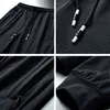 Homens Calças Calças Sweatpants Mens Streetwear Calças de Trilha Fitness Roupas Homens Moda Verão Casual Quick-Secagem Pant 211112