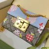 Messenger Bag Chain Schoudertassen Clutch Portemonnee Mode Aardbei Afdrukken Echt leer Sleutelslot Gouden metalen gesp Hoge kwaliteit Patchwork Kleur