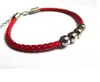 Bracelet porte-bonheur pour hommes et femmes cette année couple d'amoureux tissé à la main quatre perles bracelets de corde rouge