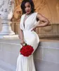 2021 Sexy African Mermaid Bridesmaid Dresses Wedding Guest Wear Deep V Neck Long Open Back Celebrity Country Party Plus Size Maid of Honor Gowns Sweep Train