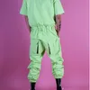 Herrbyxor Jumpsuit män ljusgrön partiell fluorescerande verktyg Set tredimensionell väska hiphop street dance dräkt drak22