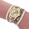 Femme mode robe montres dames Bracelet montre remontage tricot serpentine Style rétro Quartz montres bon cadeau