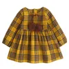 Detaljhandel vår höst tjejer klänning england stil gul plaid päls boll båge baby prinsessa barn kläder 3-7t az1061 210610