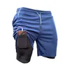 Shorts esportivos de lazer masculino de camada dupla falso de duas peças de secagem rápida capris bolso com zíper corrida pode ouvir fones de ouvido durante o exercício calças de caminhada de ciclismo