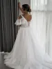 Magnifiques robes de mariée de taille plus robe de mariée en dentelle appliques balayage train col en V manches courtes sur l'épaule tulle perlé plage Ga7656982