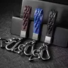 3 Colors Metal Stirrup Leather Keychain Men Hand Woven Car Styling Keyring Holder Charm Accessories Auto Decorative Jewelry Gift G1019