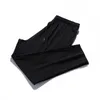 Dorywczo spodnie Mężczyźni Joggers Spodnie Dysfunda Solidna Kolor Elastyczna Talia Spodnie Fitness Sportswear Moda Lato Wiosenne spodnie dresowe 211013