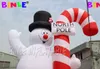 Muñeco de nieve inflable gigante de Navidad para celebrar las fiestas, muñecos de nieve escarchados iluminados con led para publicidad, decoración de eventos al aire libre