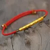 Bracelets porte-bonheur bouddhiste tibétain nœuds faits à la main fil créatif perles de cuivre irrégulières rouge noir corde tirant Bracelet pour femmes hommes