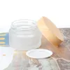 Frosted Glass Jar Cream Butelki Okrągłe Słoiki Kosmetyczne Ręka Twarz Pakowanie dzbanka 5g 50g Dzbanek z drewnianą pokrywą DH5488