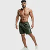 Mens Fitness Shorts Mens Gyms Loose Short Pants Joggers Workout Thin Quick dry Beach Shorts Male Summer Casual Crossfit Clothing G1218