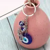 2021 Turkse boze oog sleutelhangers lucky blue eye fatima hand charm trinket sleutelhanger vintage sleutelhanger voor mannen vrouwen auto sleutel hanger G1019