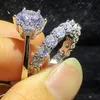 サイズ5-10高級ジュエリーの結婚指輪リアル925スターリングシルバーインストップ売りラウンドカット9 mmホワイトTopaz Czダイヤモンド宝石永遠の女性カップルブライダルリングセットギフト