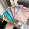 Smycken lådor 50pcs Flannel Förpackning Påsar Chic Lila Bröllop Favor Giftväska Velvet Drawstring påse för kosmetiska makeup ögonfransar 1127